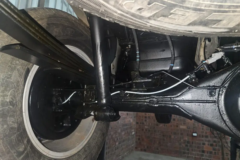 Rear axle & fuel tank after treatment — cleaned, neutralised and coated