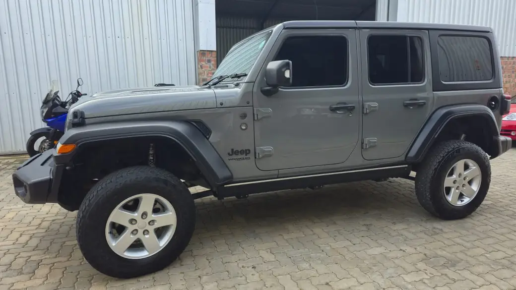 Grey Jeep Wrangler Unlimited four-door outside the Anti-Rust workshop