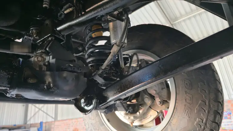 Suspension links and spring seat