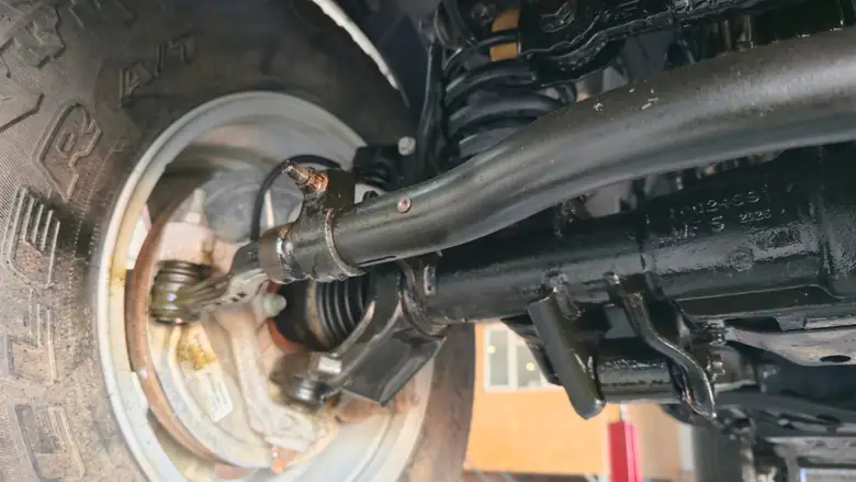 Front axle, tie rod and steering knuckle after treatment