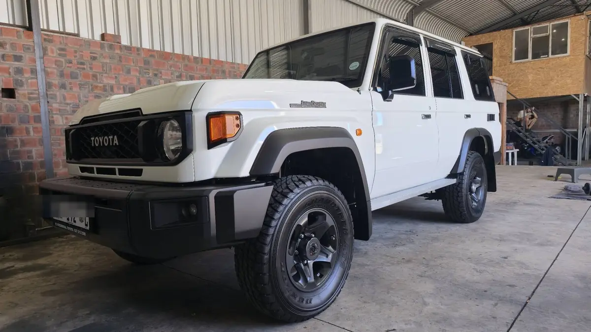 White Toyota Land Cruiser 76 station wagon in the Anti-Rust workshop