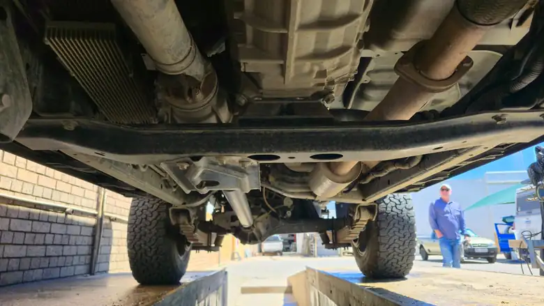 Under the bash plate before treatment