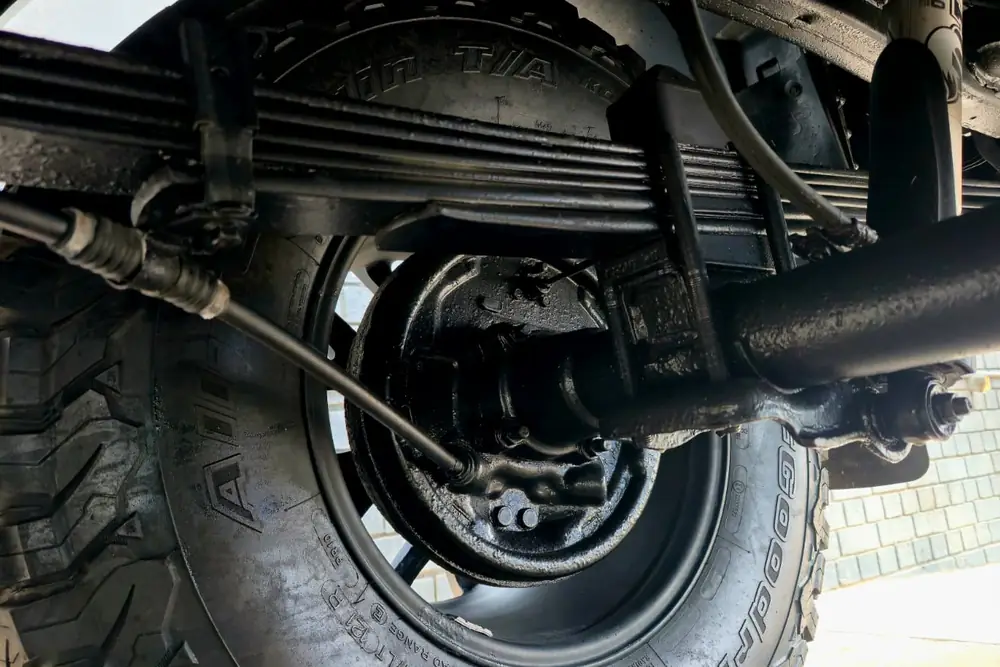 Leaf springs & brake drum after treatment — cleaned, neutralised and coated